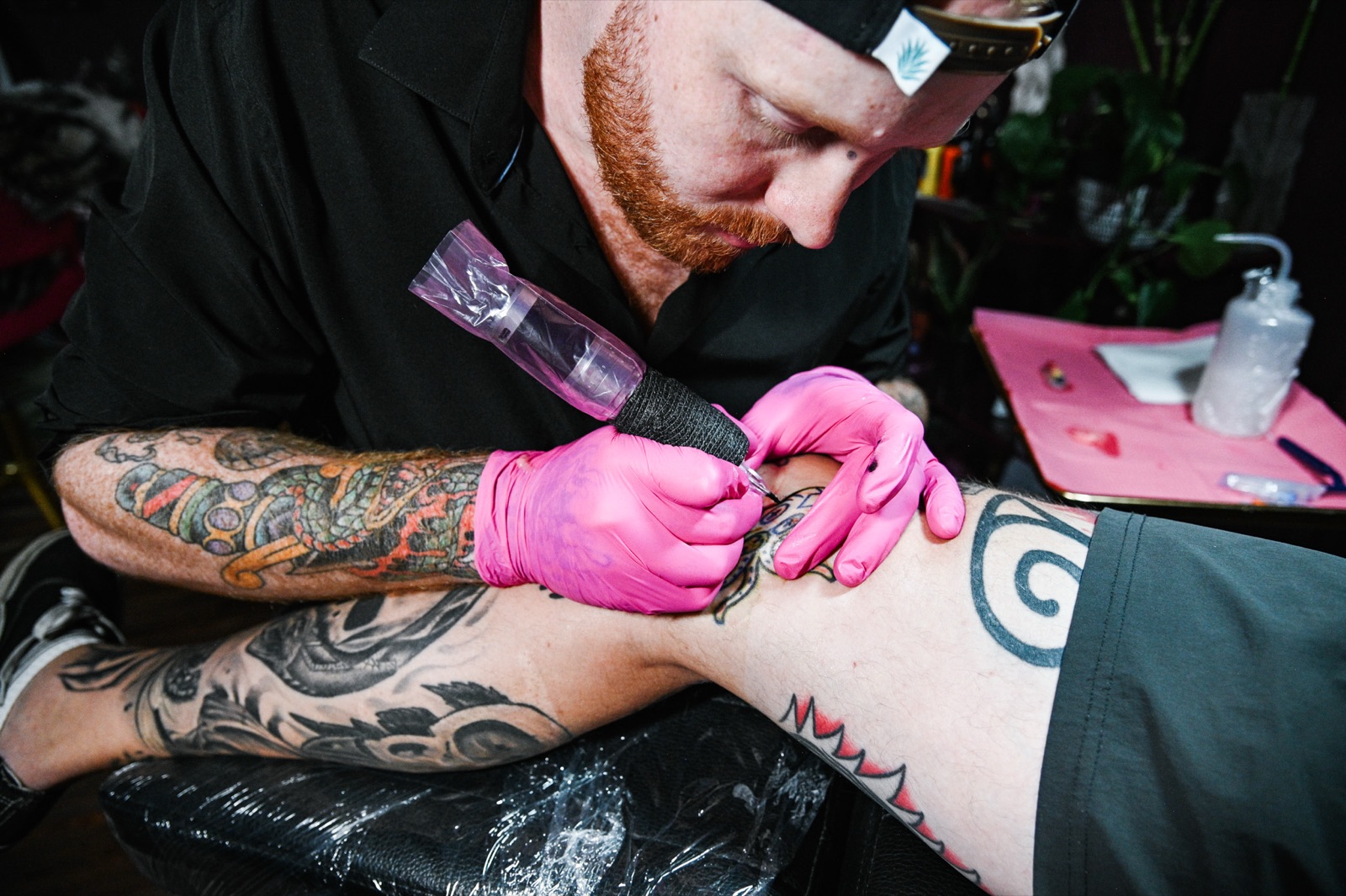 Taylor tattooing a client at The Fine Line.