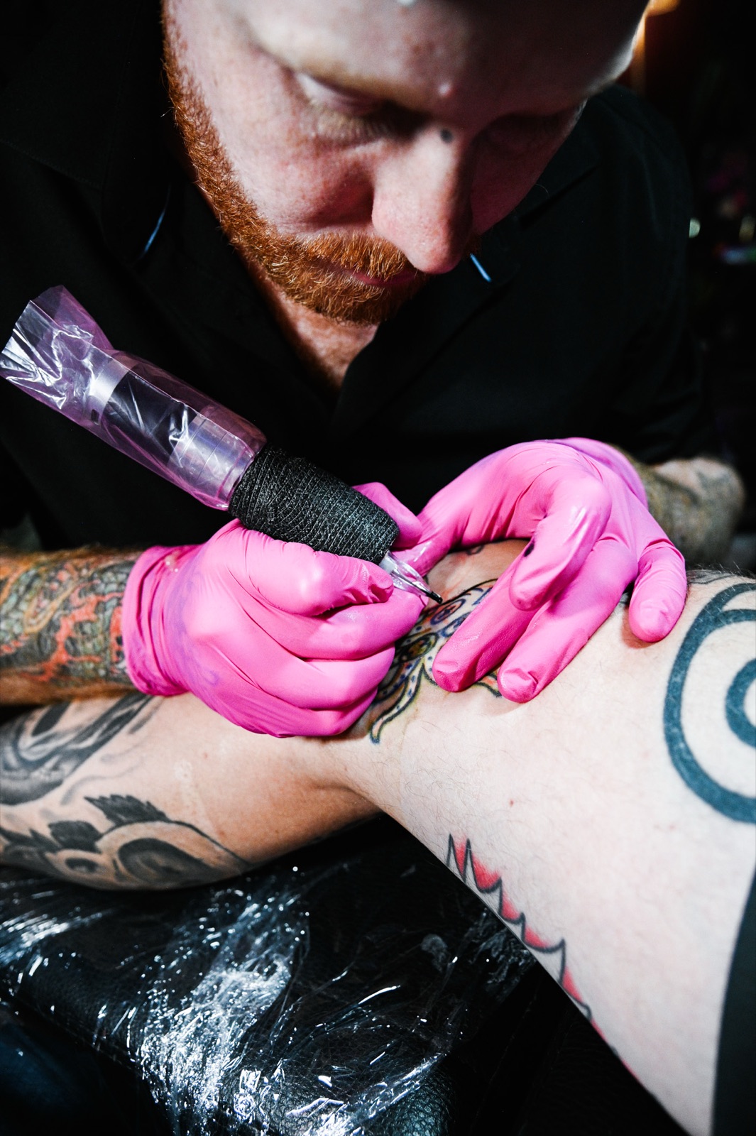 Taylor tattooing a client at The Fine Line.